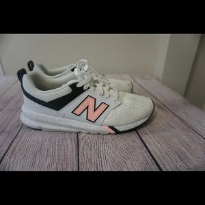 White and Pink New Balance shoes